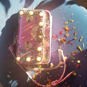 Pink silk bag by Eva Mendes